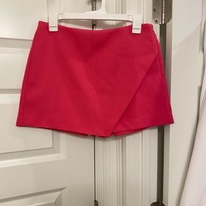 Pink Ripple Asymmetric mini skort hot pink